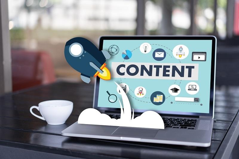 A content marketing publication on a laptop.
