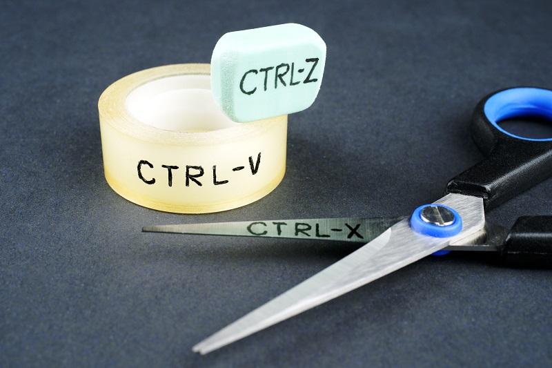 Command keys written on tape and scissors.