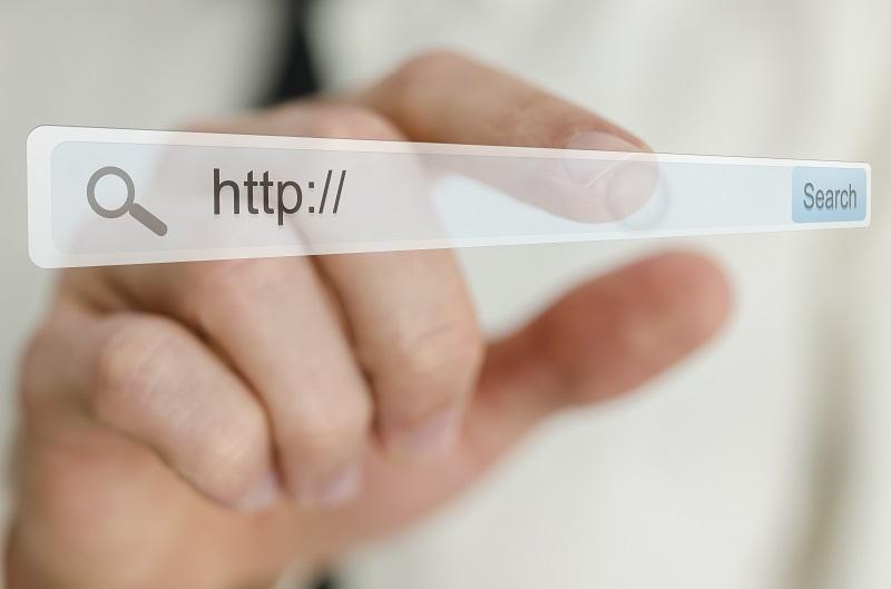 Hand on search bar.