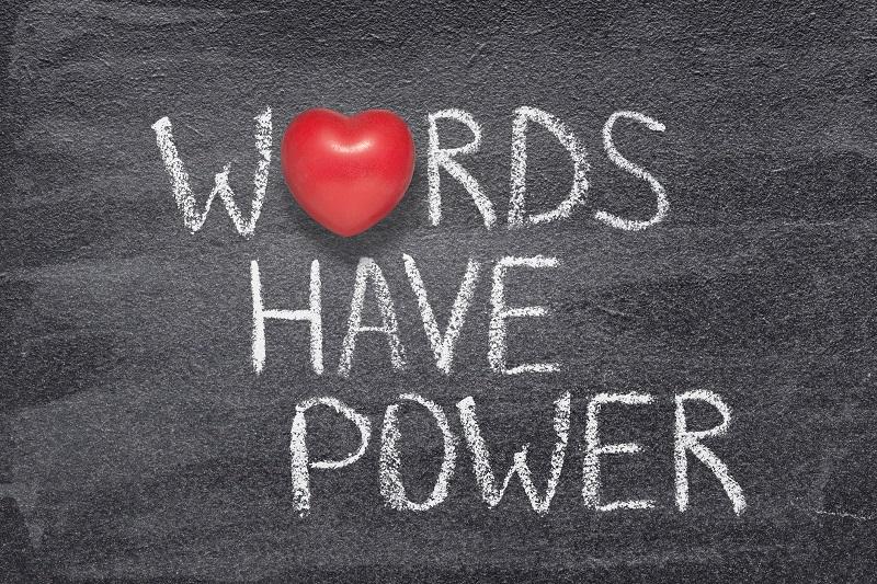 A chalkboard that says 'Words have power'.