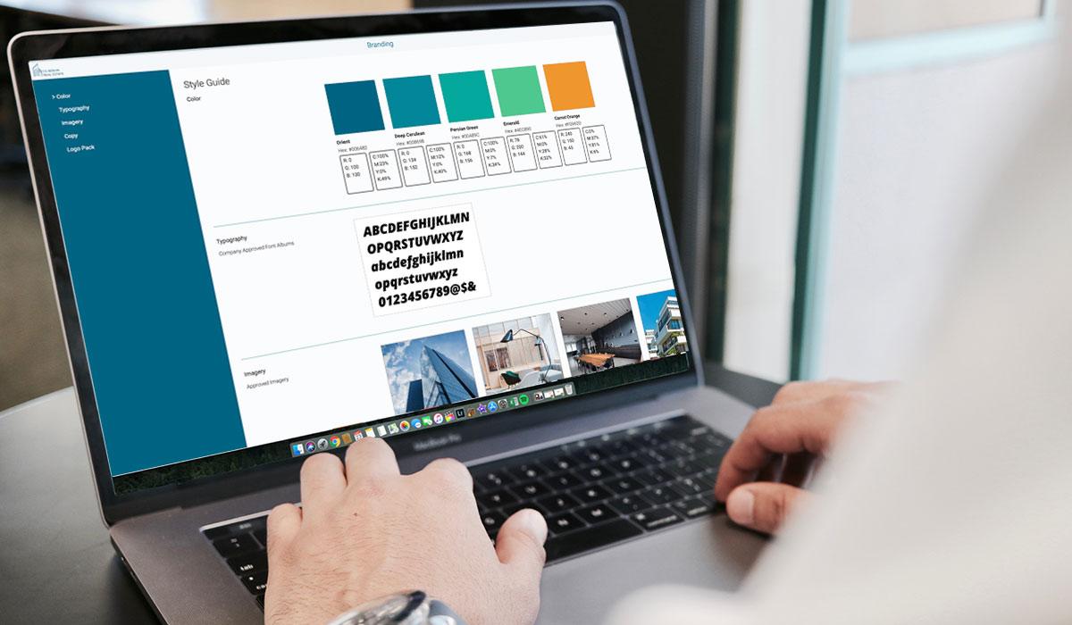 A brand style guide on a laptop.