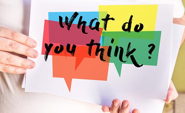 A cue card that reads 'what do you think?'