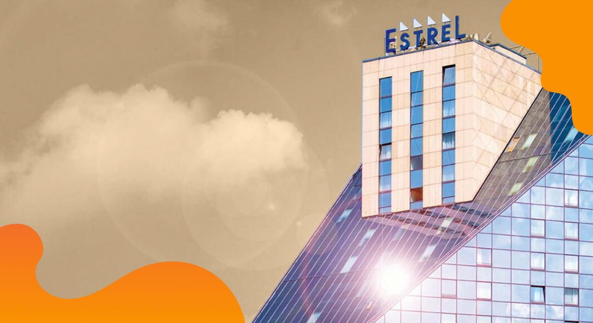 ESTREL Berlin header image in orange of the largest German hotel.