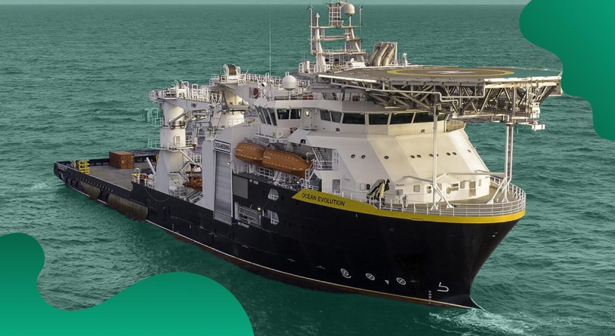 Oceaneering header image in green showing a ship during a mission.