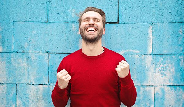 An excited, happy man.