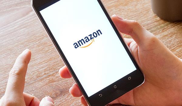 A person using Amazon on their smartphone.