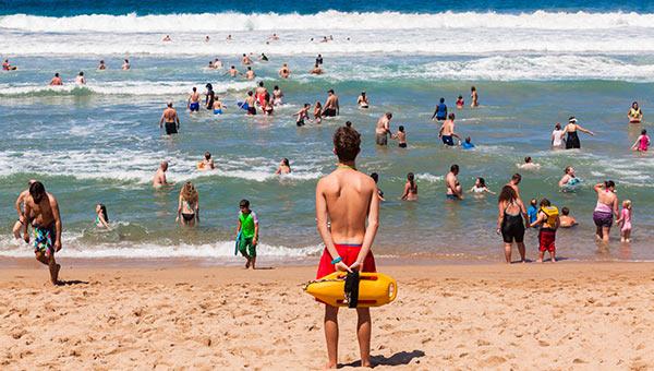 A lifeguard watching a beach.