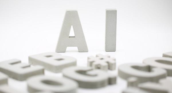Die Buchstaben A und I neben weiteren Buchstaben, sie stehen symbolisch für das AI-Dateiformat.