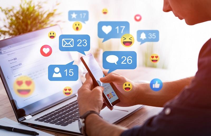 A man builds a social media profile.