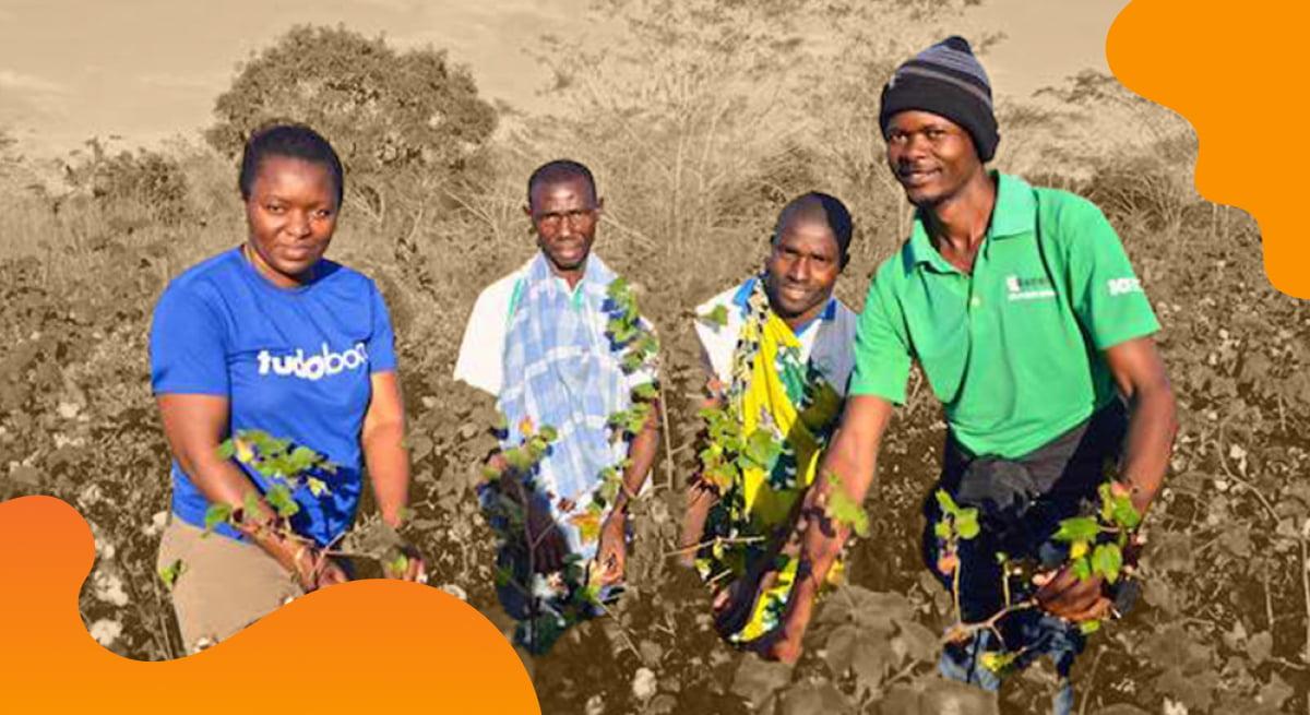The Better Cotton Initiative header image in orange showing people in a cotton field.