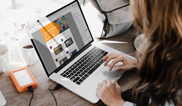 Someone creating a header on a laptop.