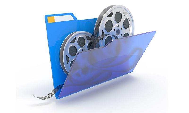Eine Filmrolle in einem Aktenordner.