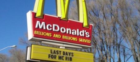 A McDonald's sign warning about the McRib's availability.