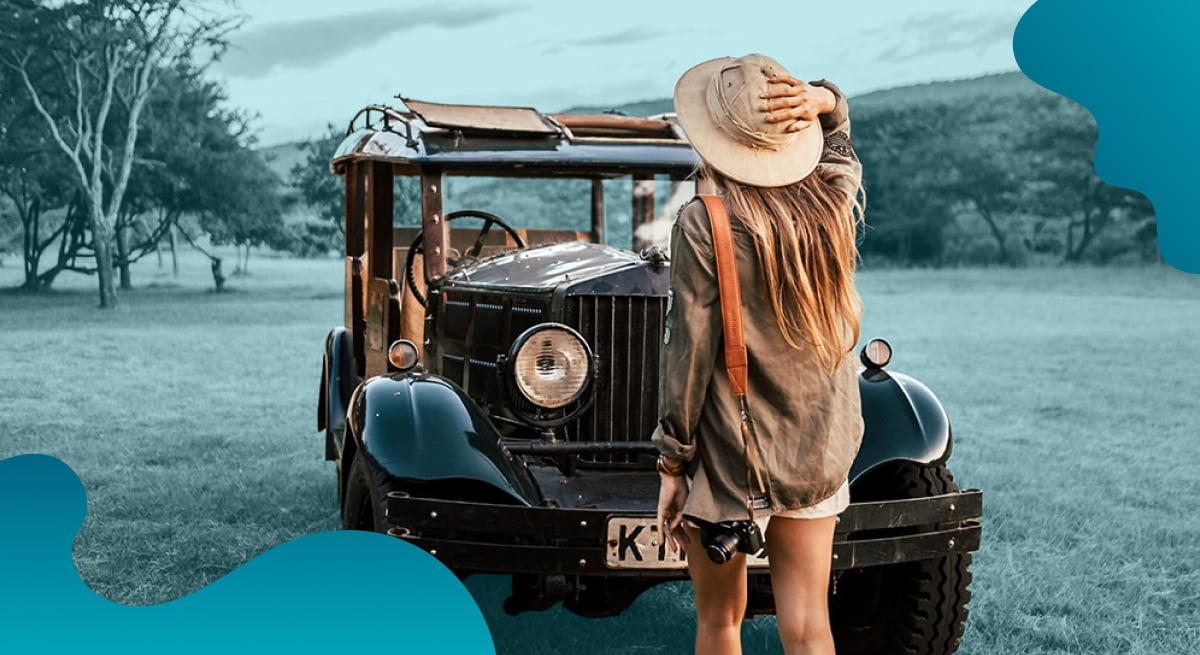 Cottars Safaris header image in blue of woman on safari tour.