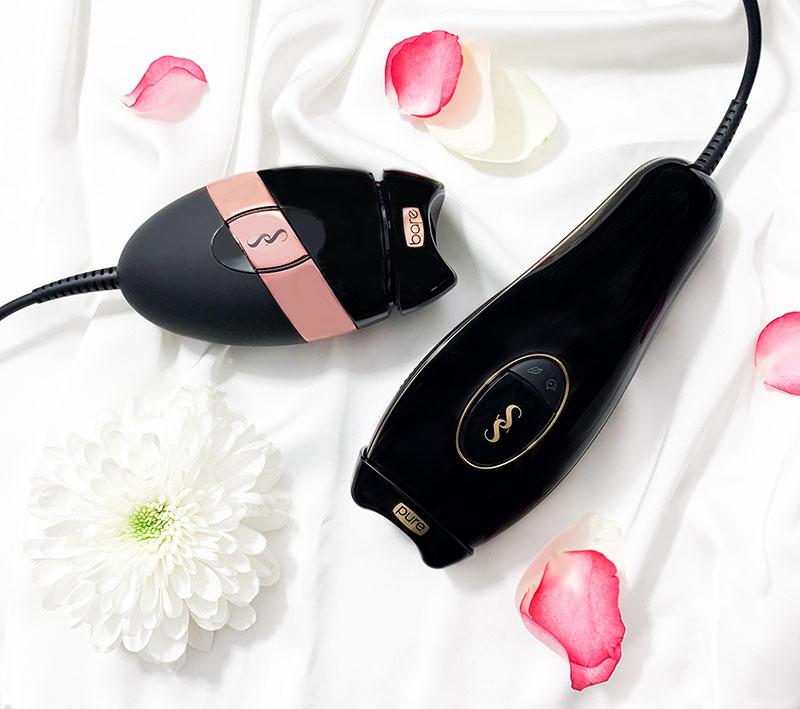 SmootSkin IPL products on a white cloth with flower pedals.