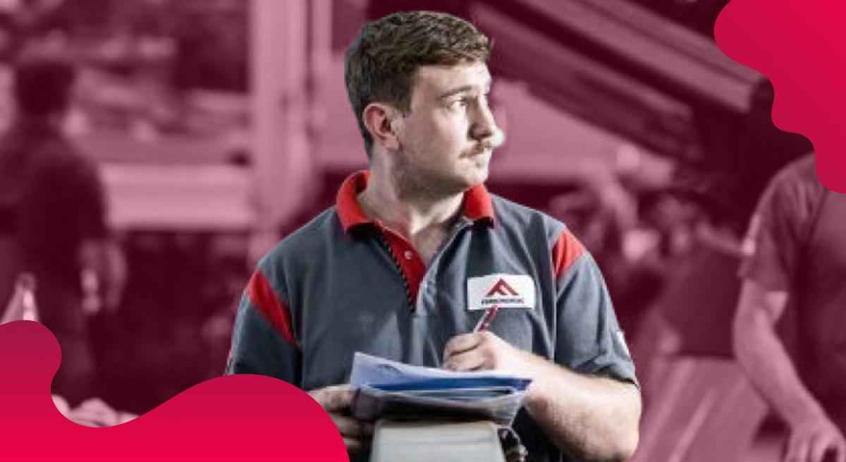 Ferronordic header image in red showing an employee at work