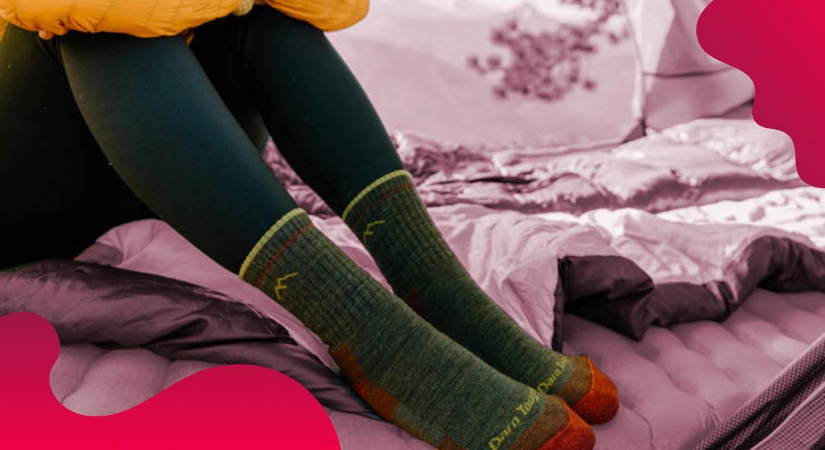 Darn Tough header image in red of high-quality socks
