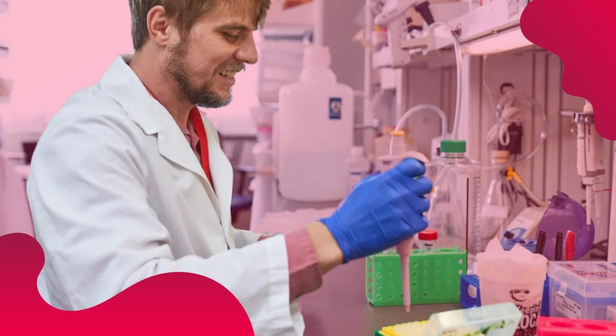 Oklahoma Medical Research Foundation header image in red showing an OMRF employee in lab.