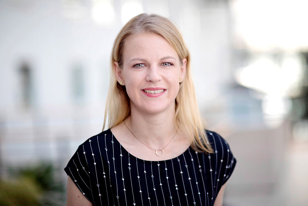 an image of Miranda Meier, Press Spokesperson at the ESTREL Hotel Berlin, Germany’s largest hotel over a blurred background