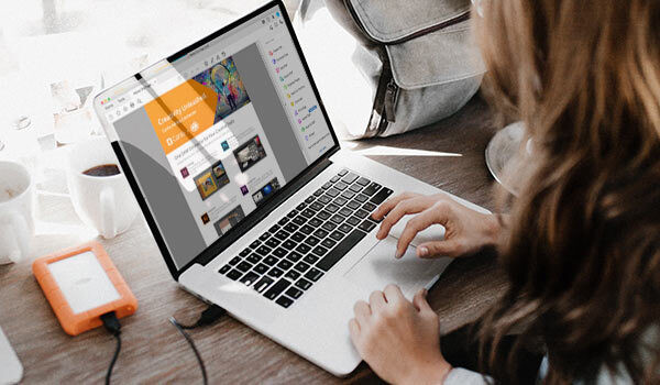 Someone creating a header on a laptop.