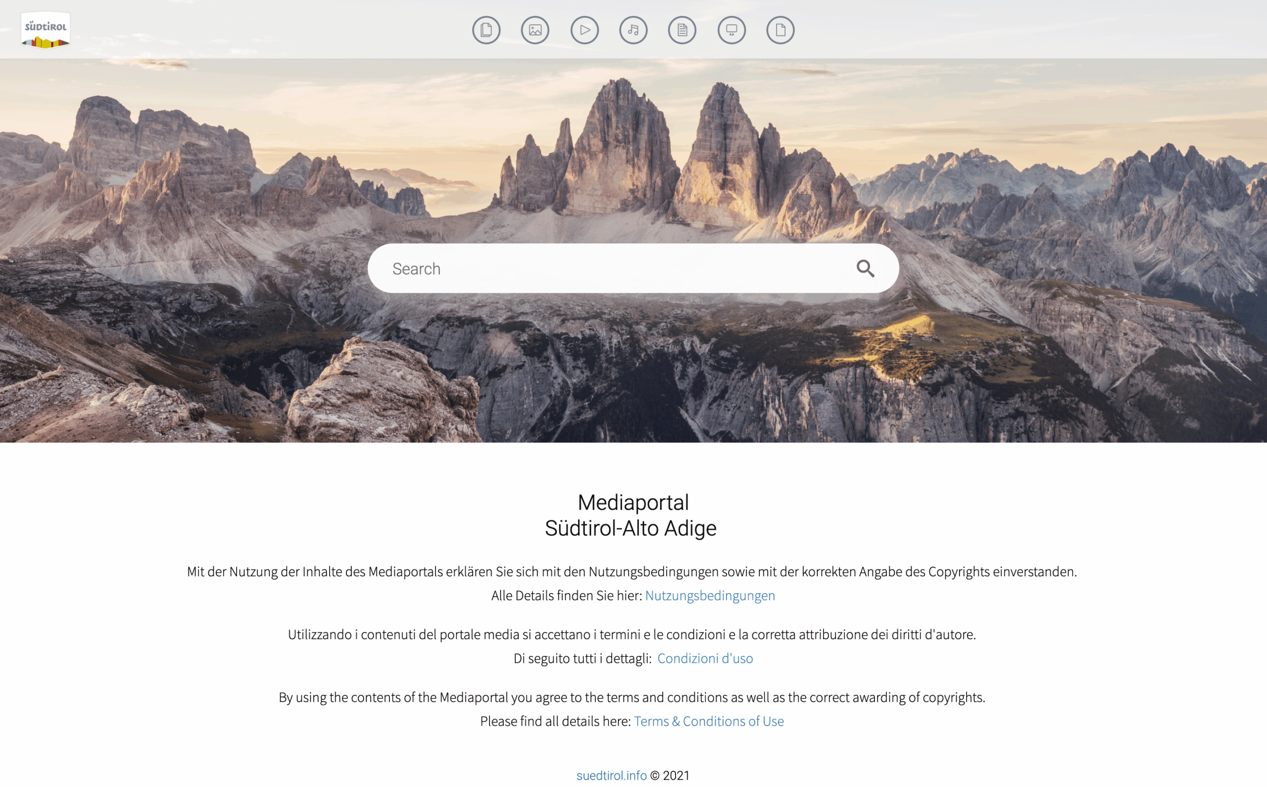 IDM Südtirol portal page, search bar over a header image of a mountain scape.